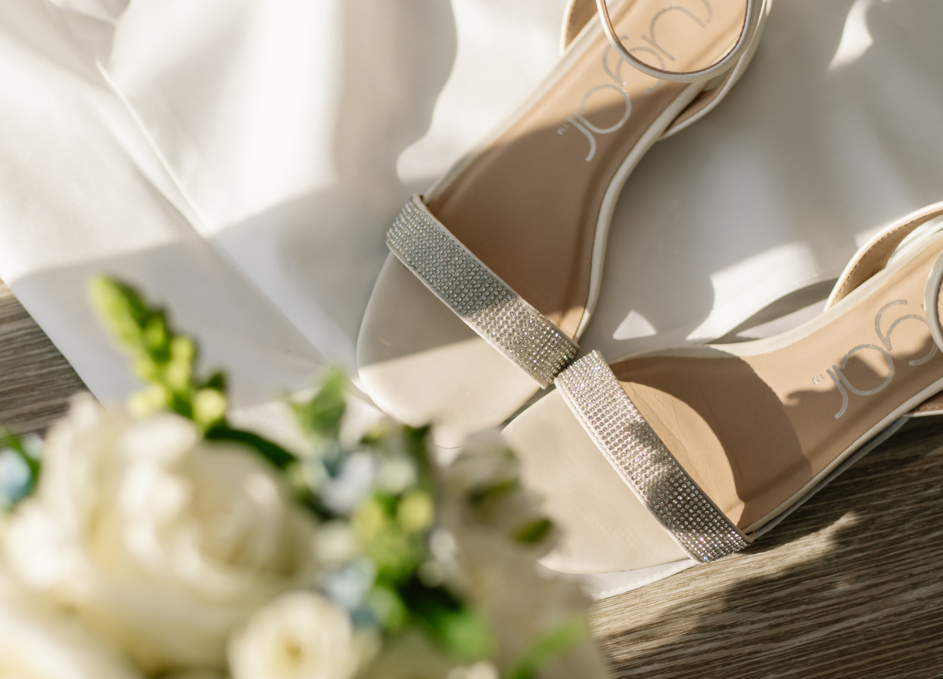 Sparkling bridal shoes in soft light
